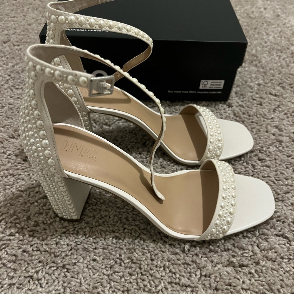 Brand new high heels, never worn. Originally $89.99